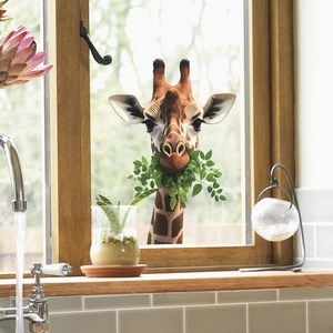 Realistic giraffe wall sticker with green leaves for home living room or kitchen window