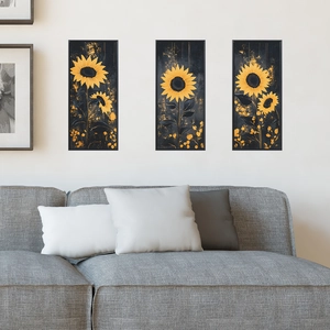 Three-piece modern black and gold sunflower wall art set above a gray sofa for home decor