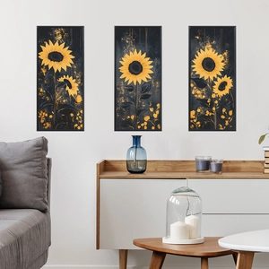 Three-piece sunflower wall art set with golden ink splatters and modern black frames