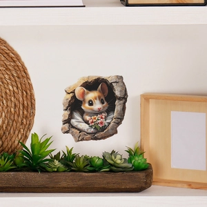 Sticker mural 3D représentant un hamster mignon avec une fleur dans un mur brisé