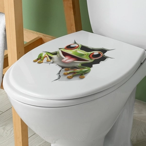3D cartoon green tree frog wall sticker with red eyes appearing from a crack