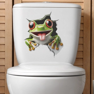 3D cute green cartoon frog wall sticker showing realistic cracked wall effect on a white surface
