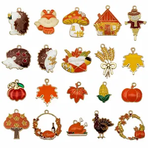 Set of 20 autumn-themed enamel alloy pendants featuring pumpkin and maple leaf designs