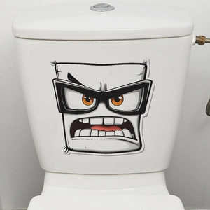 Funny angry cartoon face toilet lid decal with orange eyes and black glasses sticker