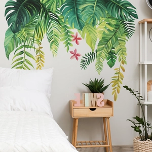 Adesivi murali con foglie tropicali di monstera e palma per decorare la camera