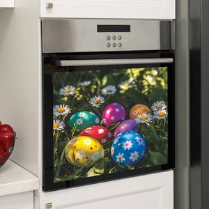 Easter floral egg wall stickers on oven door featuring colorful eggs and daisies on green grass