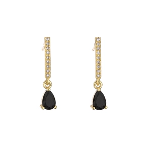 Detailed close-up of gold pear-cut black zircon drop earrings with white stone accents