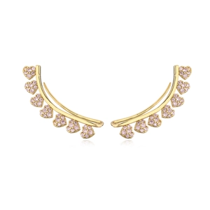 Detailed view of curved ear climbers with pink zircon pavé hearts in gold plating