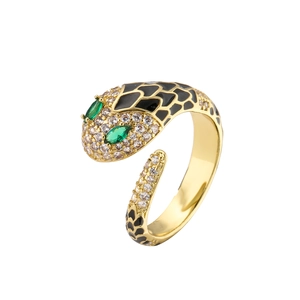 Anello serpente regolabile oro con macchie in smalto nero e occhi in zircone verde
