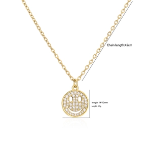 Collar dorado con colgante de carita sonriente de circonitas y cadena de 45 cm