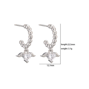 Detail view of silver heart wing hoop earrings with dimensions and weight specs