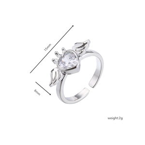 Detailed view of adjustable heart ring with wings and crown showing 15mm width
