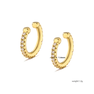 Detail view of 1.4mm gold plated ear cuffs with micro-paved white cubic zirconia stones