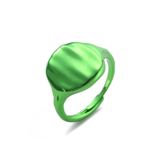 Detailed macro view of wide green electroplated ring with wavy texture and open band
