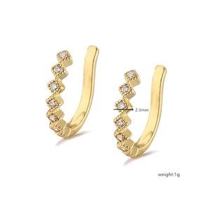 Detail view of 2.3mm gold-plated ear cuff with tiny inlaid cubic zirconia stones