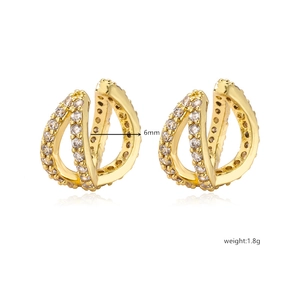 Detail of 18K gold plated cuff earrings with micro-pave cubic zirconia crystals