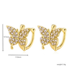 Macro view of gold butterfly ear cuff with micro-pave cubic zirconia, 11.8mm wide