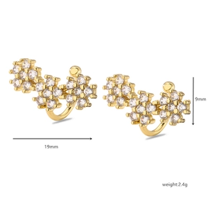 Detail showing gold-plated flower ear cuffs with cubic zirconia and 19mm length dimensions