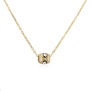 Detalle del collar de pilar ojo turco dorado con esmalte y circonitas blancas finas