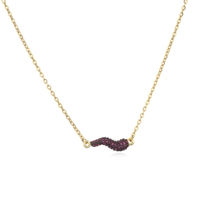 Elegant gold necklace with wave pendant featuring pavé-set purple cubic zirconia stones