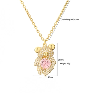 Collier avec pendentif ours en pavé et pierre rose en forme de cœur sur chaîne dorée