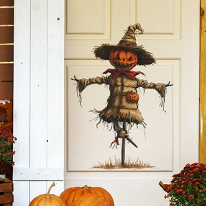 Détail de l'autocollant Halloween épouvantail citrouille sur une porte avec décoration