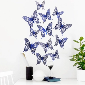 Blue 3D hollow butterfly wall stickers with floral cutouts for modern home decor