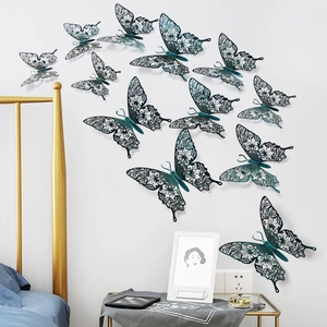 3D hollow teal butterfly wall stickers with intricate laser-cut floral patterns for home decor