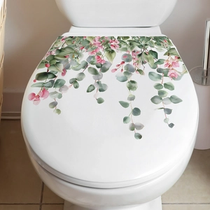 Watercolor tropical green leaves and pink flowers wall sticker on a white toilet lid