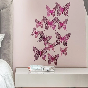 Detailed 3D hollow butterfly wall stickers in gradient pink-purple on a home interior wall