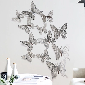 Detail of 3D hollow butterfly wall stickers with silver laser-cut metallic finish