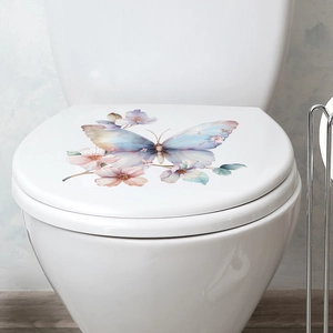 Detail of a watercolor purple butterfly and pink floral sticker on a white toilet lid