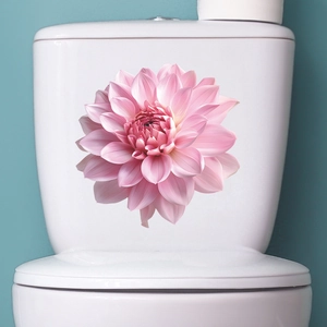 Detailed view of a pink dahlia toilet sticker applied on a white surface for home decor