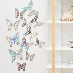 Detail of 3D hollow butterfly wall stickers with intricate laser-cut floral patterns