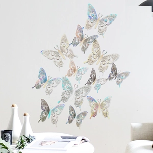 Macro detail of iridescent hollow 3D butterfly wall stickers for home decor