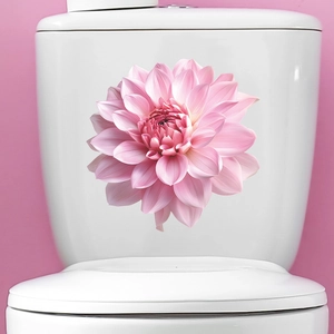 Detailed view of pink dahlia floral toilet sticker on white ceramic surface