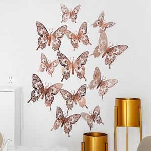 Detailed 3D hollow butterfly wall stickers in rose gold finish for home wall decor