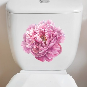 Detail of pink peony flower wall sticker applied on white toilet tank for home decor