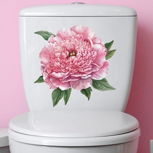 Vibrant pink peony flower toilet sticker for bathroom decor on white ceramic surface
