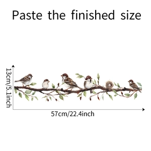 Detailed size specifications for bird and tree branch wall sticker showing 57cm length