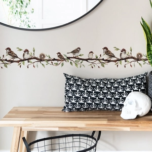 Artistic wall stickers featuring birds on branches and a nest for bedroom decor