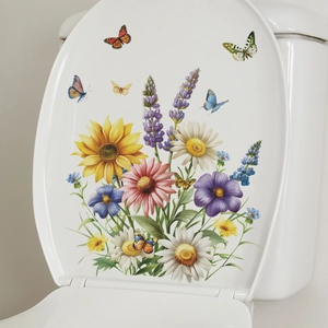 Floral wall sticker with sunflowers and butterflies on a white ceramic toilet lid