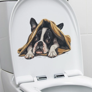 Detail of cute French Bulldog decal applied to a white ceramic toilet lid for home decor