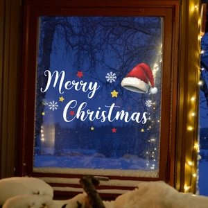 Adesivi natalizi per finestre con cappelli di Babbo Natale rossi e fiocchi di neve