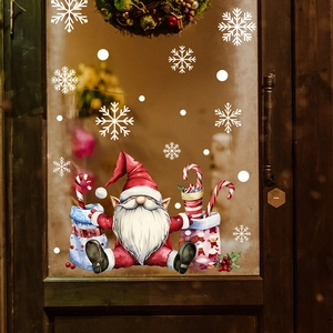 Christmas gnome window stickers with red gift bags and white snowflakes for home decor