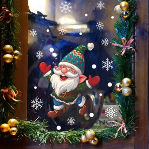 Christmas window gnome sticker set with white snowflakes on glass with festive decorations