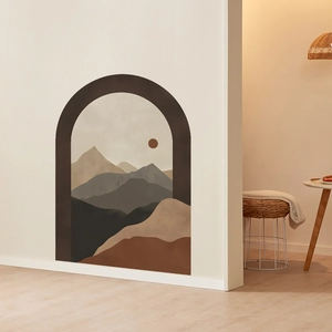 Abstract mountain wall sticker with earth tone sun design in minimalist home interior