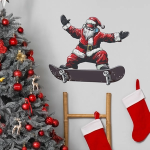 Detail of Santa Claus skateboarding wall sticker on a minimalist grey wall for Christmas decor