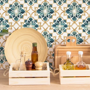 Close-up of green mandala pattern self-adhesive tile stickers used in a kitchen setting
