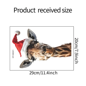 Flat lay of Christmas giraffe wall sticker with size measurements 29cm by 20cm